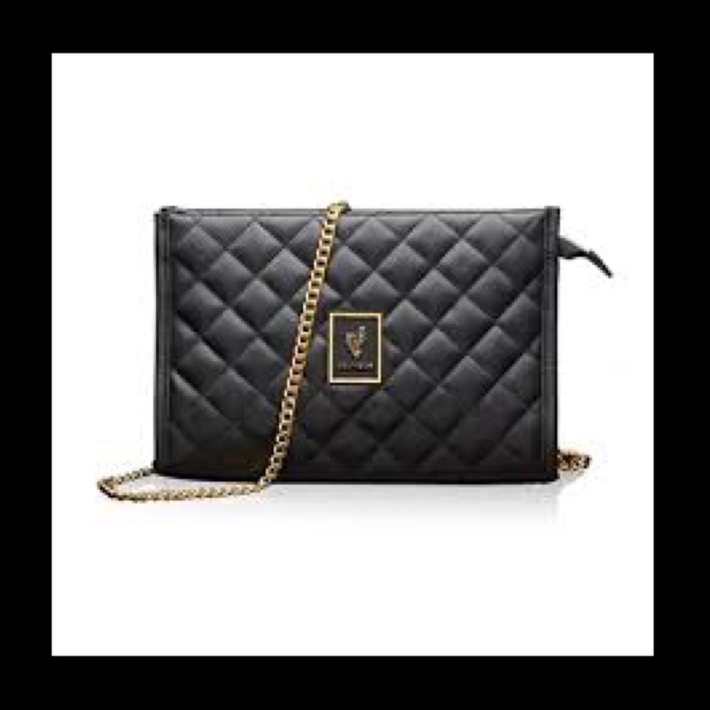 Black purse with gold chain